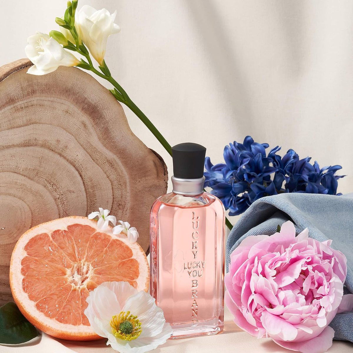 Lucky Brand Lucky You Eau de Toilette for Women, 3.4 fl oz | Women's fresh floral citrus eau de toilette. Perfume with notes of ruby red grapefruit, creamy sandalwood, and peony.