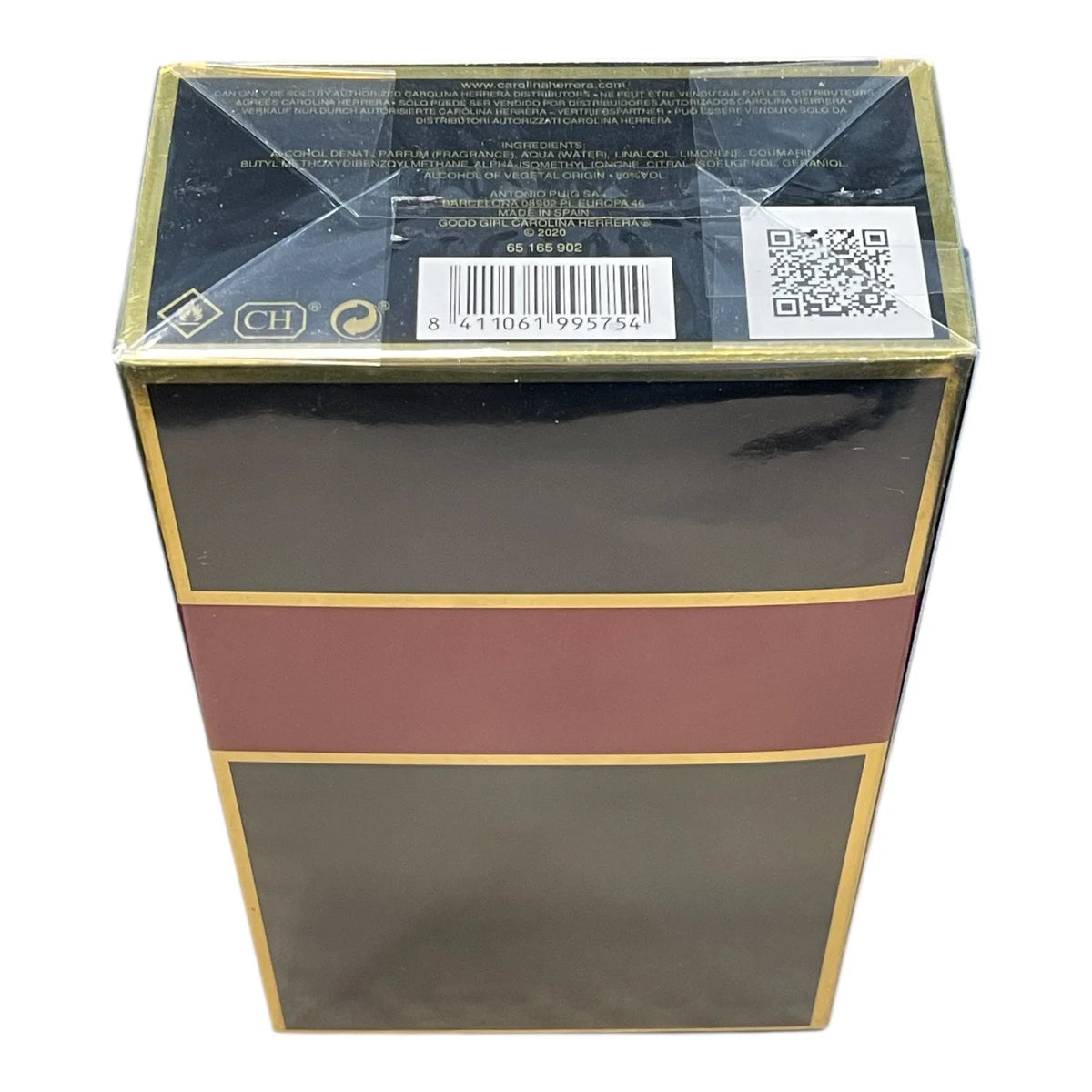 A rectangular product box with a glossy black finish, featuring a wide horizontal burgundy band across the middle and thin gold borders. The top flap is sealed with clear plastic wrap and shows a barcode, QR code, and small certification logos.