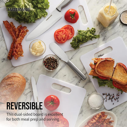 Farberware reversible cutting board with food items on a marble surface