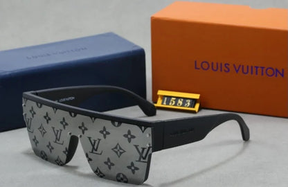Louis Vuitton shield sunglasses with a gray and black monogram pattern, displayed with an orange Louis Vuitton box, a blue Louis Vuitton case, and a small gold tag on a gray surface.