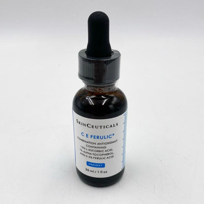 A 30 ml amber glass dropper bottle of SkinCeuticals C E Ferulic combination antioxidant serum, featuring a white label with blue text and a black dropper cap, set against a plain white background.