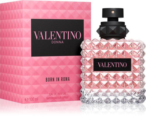 Valentino Donna Born in Roma Eau de Parfum bottle with a textured pink and clear diamond-patterned glass body, black cap, and a pink box with a black Valentino logo label.